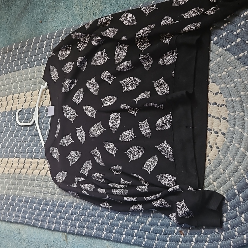 Black long-sleeved shirt with owls